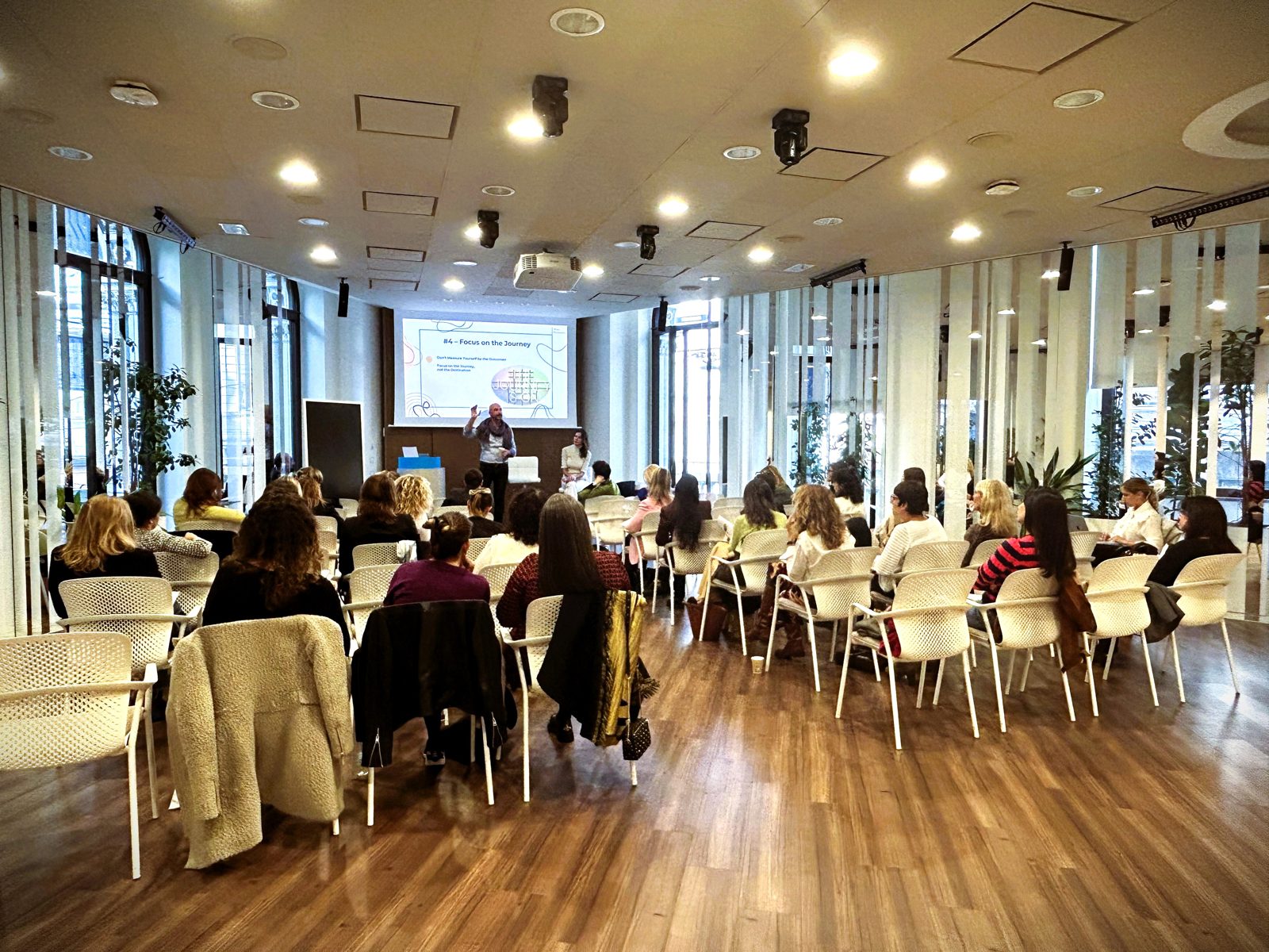 The workshop room in Milan filling up before the session starts