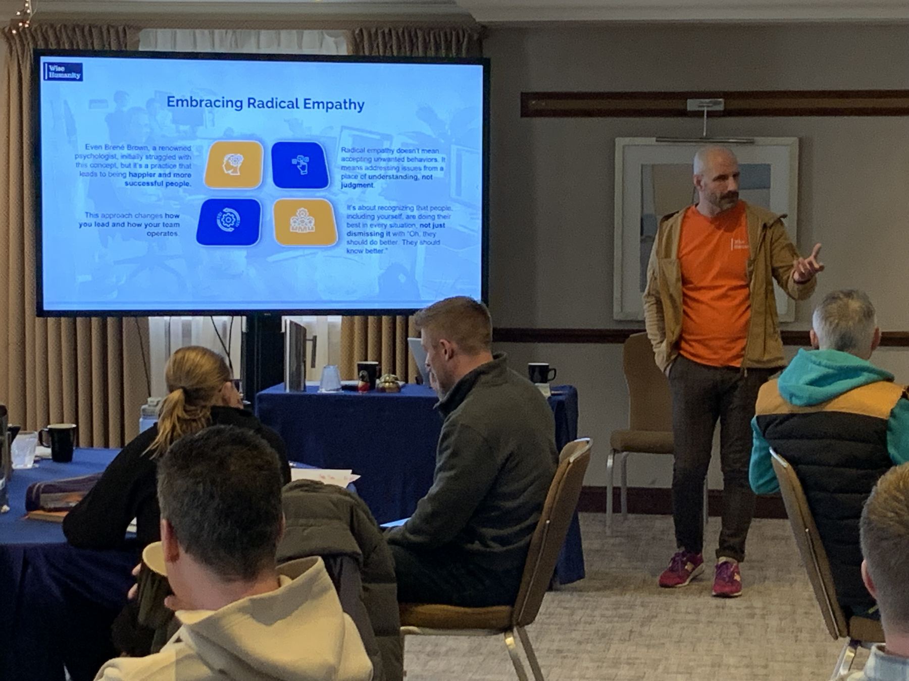 A Wise Humanity facilitator working with a leadership team